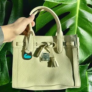 Dooney & Bourke east/west bag in Cream Color